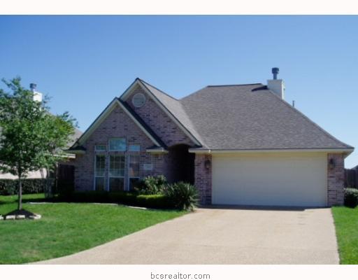 3743 Essen Loop College Station, TX 77845 - Photo 1 of 1 a front view of house with a garden