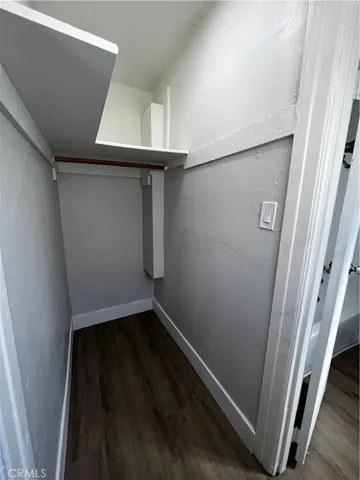 a view of small space with racks on the wall