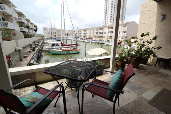 a view of a chairs and table in the terrace