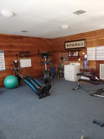 a view of a room with gym equipment