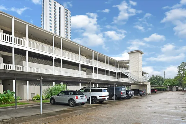 a car parked in front of a building