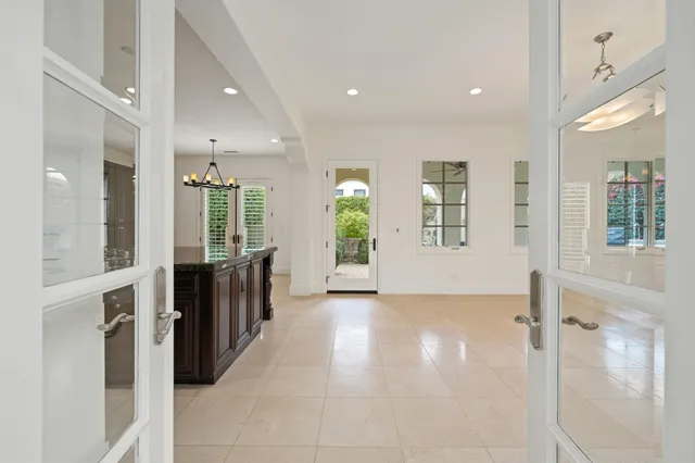 a view of a big room with windows