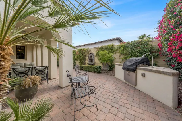 a view of a back yard of the house