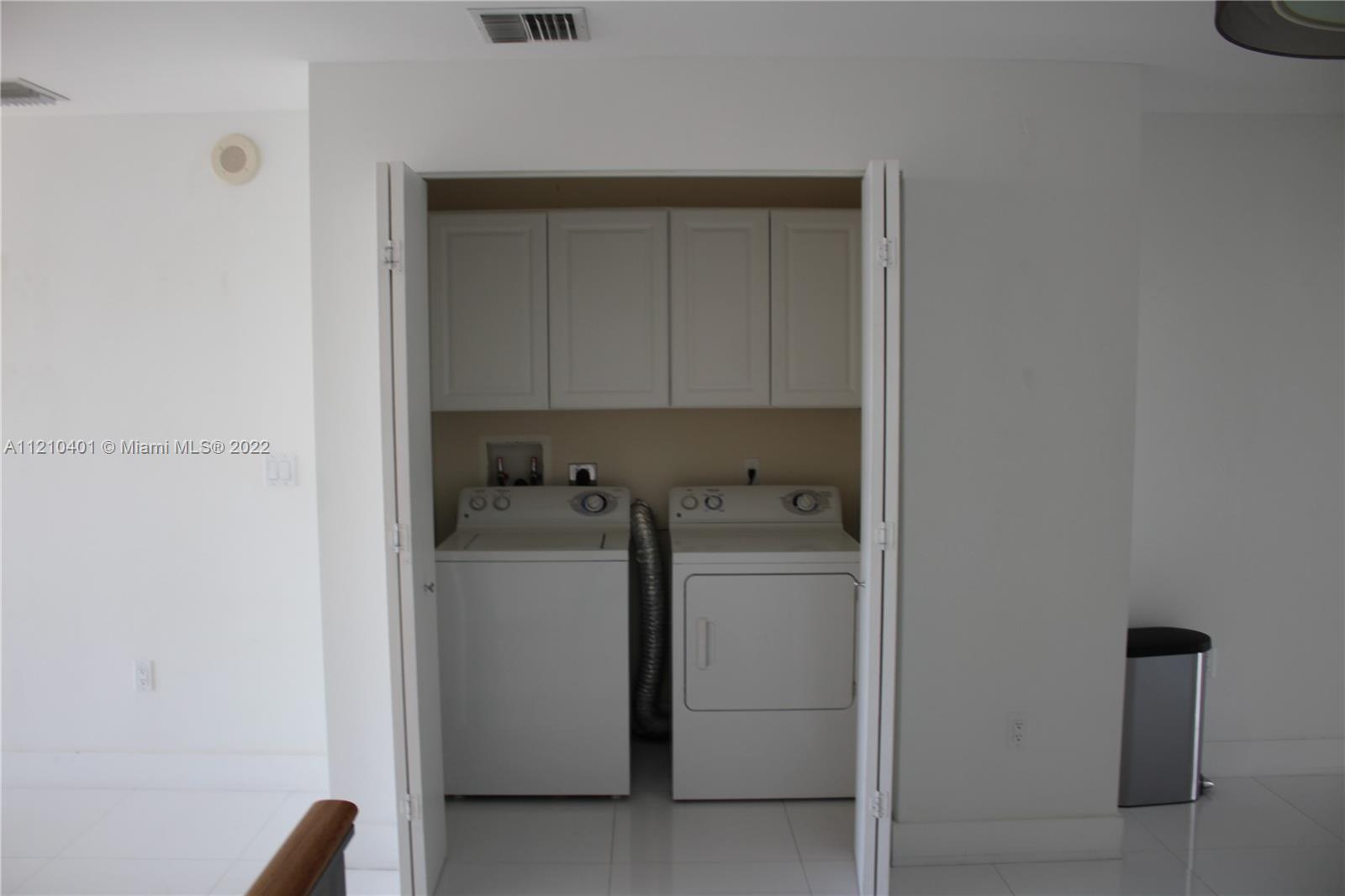 92 Southwest 3rd Street, Unit 5204 Miami, FL 33130 - Photo 12 of 20 a view of washer and dryer