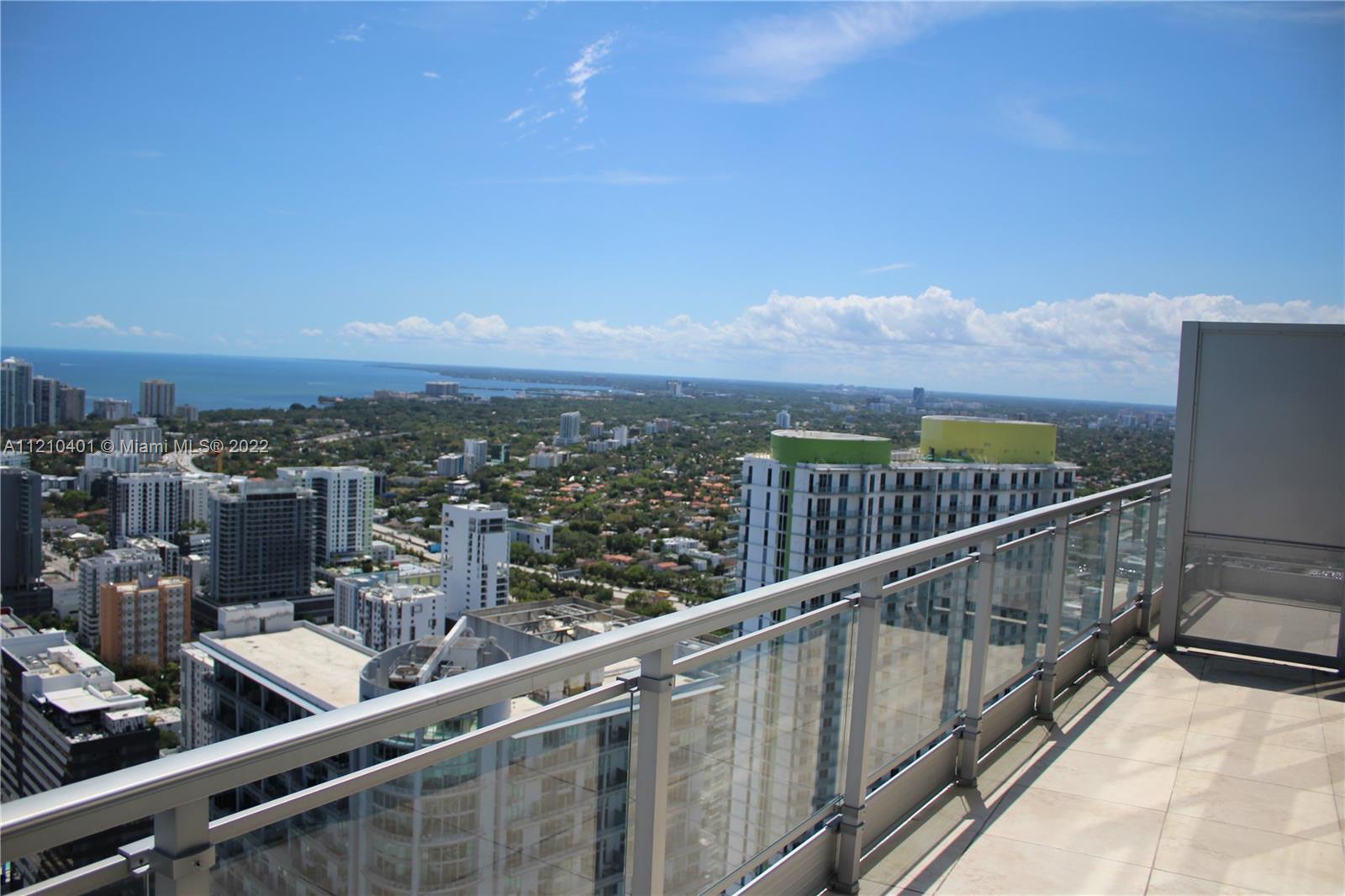 92 Southwest 3rd Street, Unit 5204 Miami, FL 33130 - Photo 13 of 20 a view of a city from a balcony