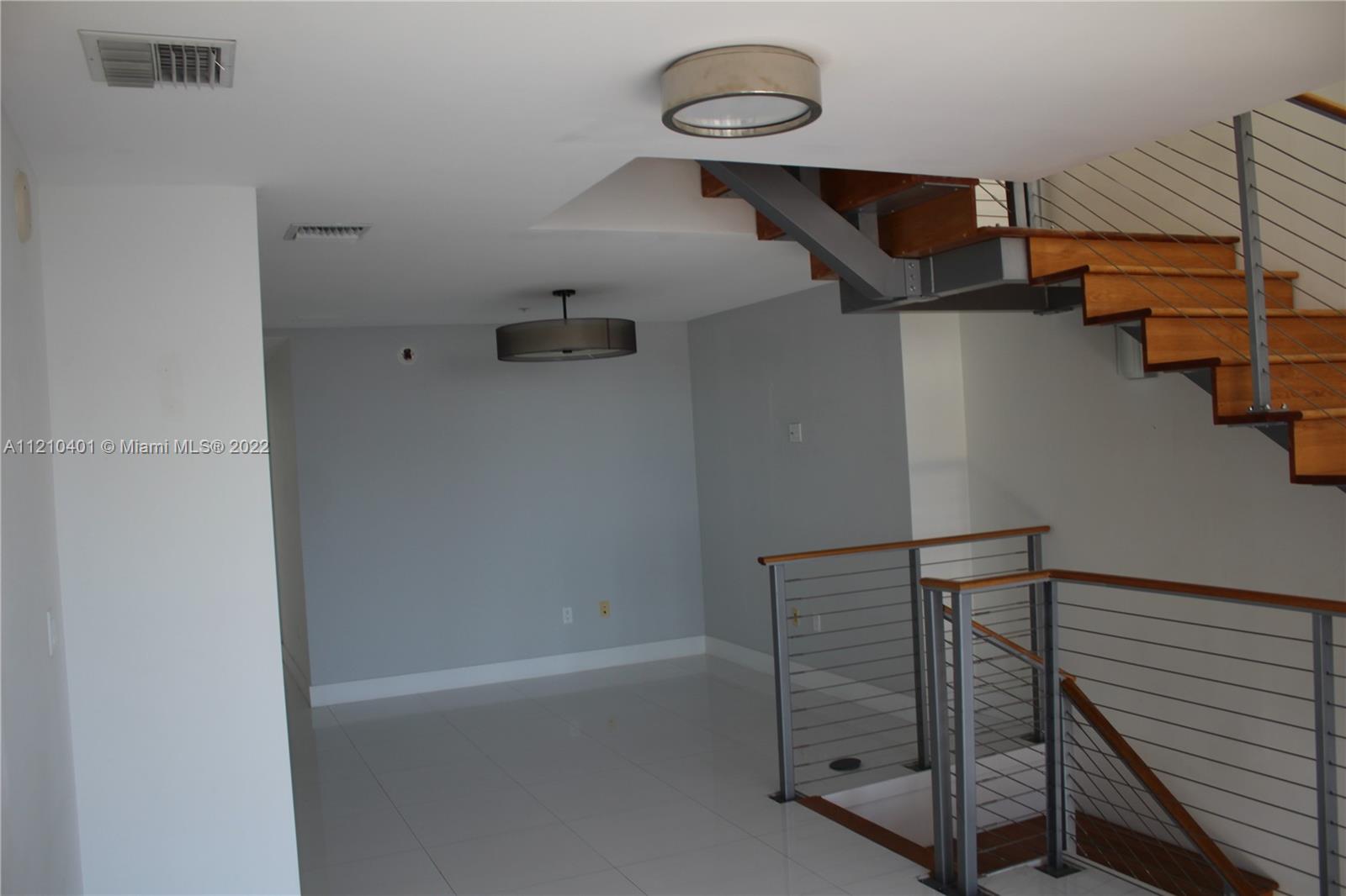 92 Southwest 3rd Street, Unit 5204 Miami, FL 33130 - Photo 7 of 20 a view of entryway with wooden floor