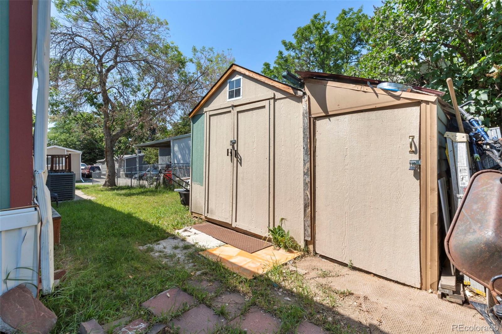 9850 Federal Boulevard Denver, CO 80260 - Photo 17 of 17 a backyard of a house with seating space