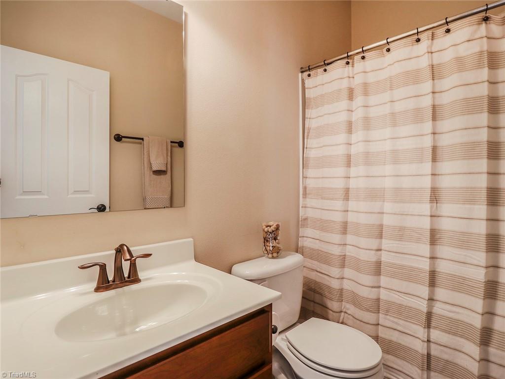 745 Spinning Wheel Point High Point, NC 27265 - Photo 17 of 34 Full bath on main with shower/tub combo.