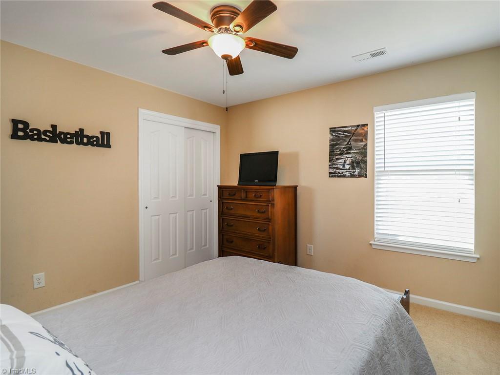 745 Spinning Wheel Point High Point, NC 27265 - Photo 23 of 34 3rd Bedroom. Overlooks backyard.