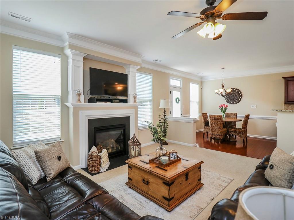 745 Spinning Wheel Point High Point, NC 27265 - Photo 5 of 34 Living room open to kitchen and breakfast area.