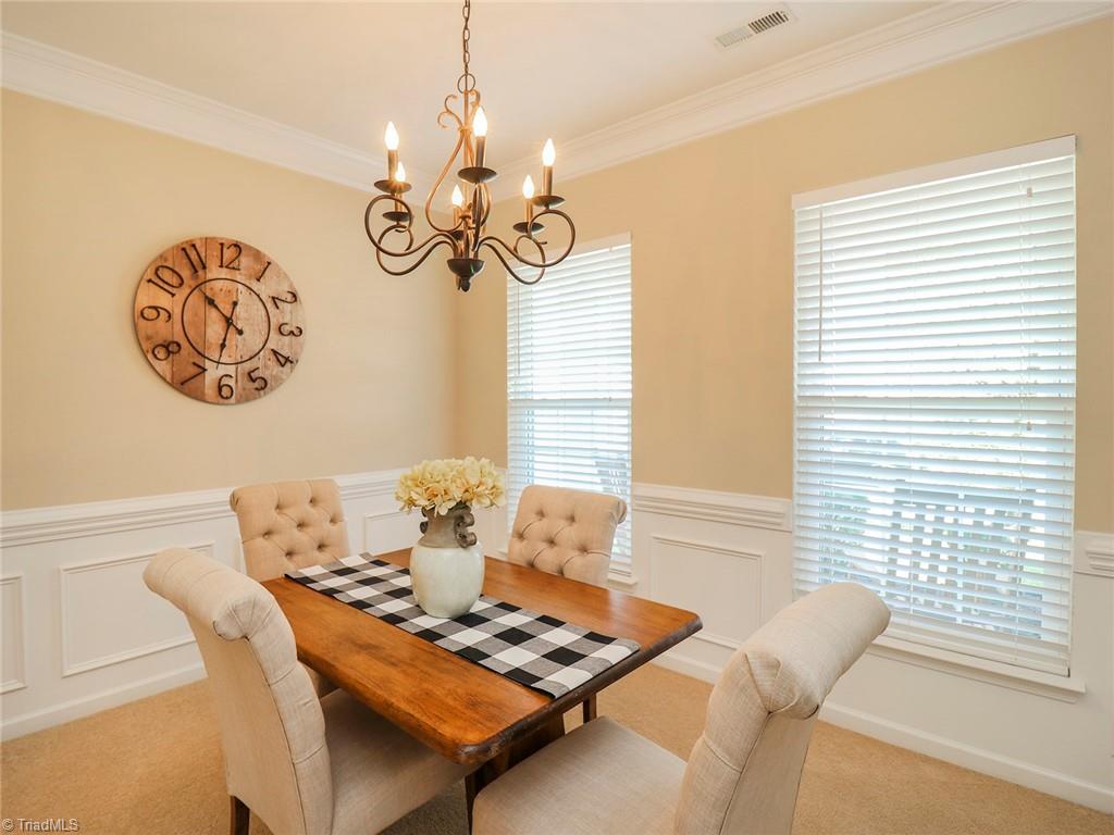 745 Spinning Wheel Point High Point, NC 27265 - Photo 7 of 34 Formal dining room with views of the front yard.