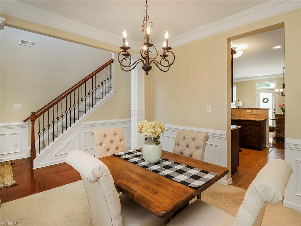 745 Spinning Wheel Point High Point, NC 27265 - Photo 8 of 34 Dining room is open to foyer and kitchen.