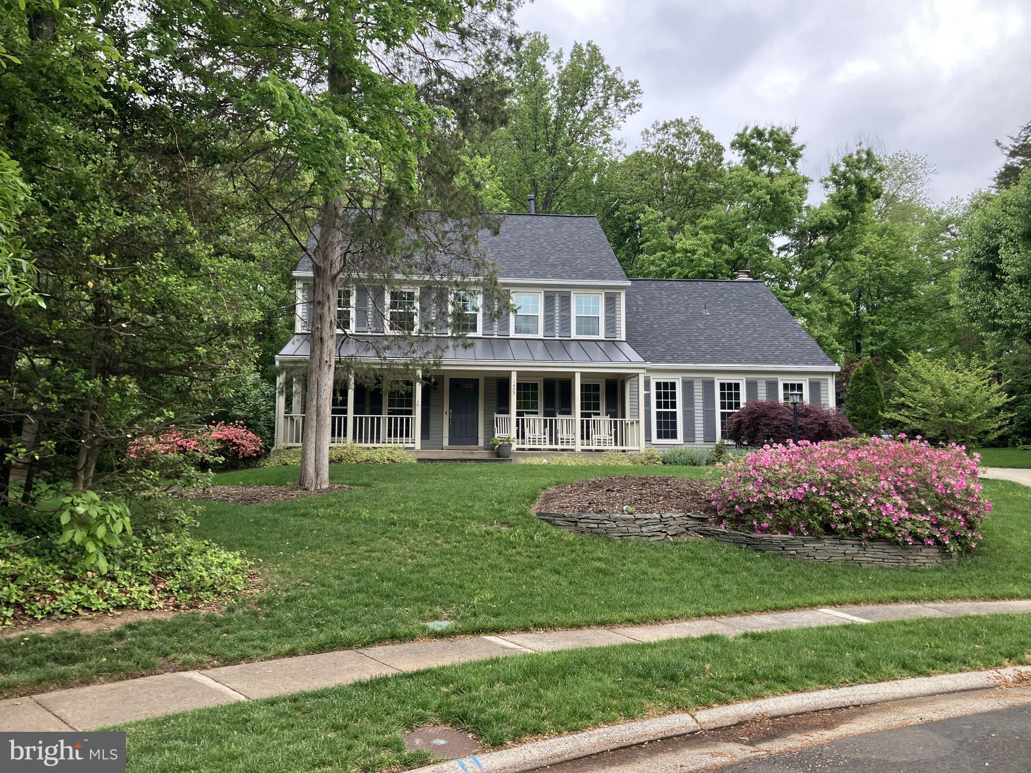 1505 Turtle Rock Lane Reston, VA 20194 - Photo 1 of 1 a front view of a house with a garden