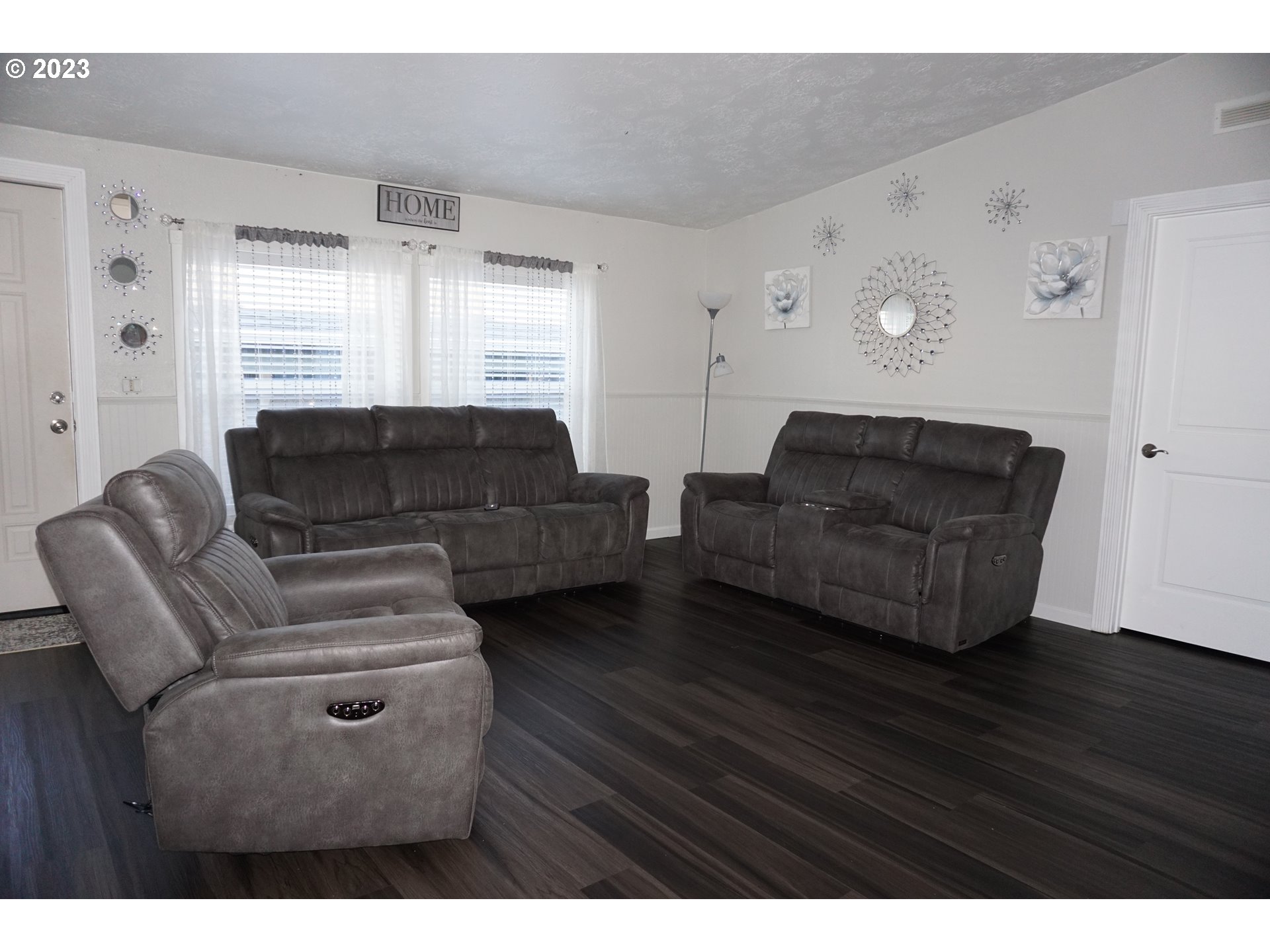 1949 Southeast Palmquist Road Gresham, OR 97080 - Photo 15 of 31 a living room with furniture and a window