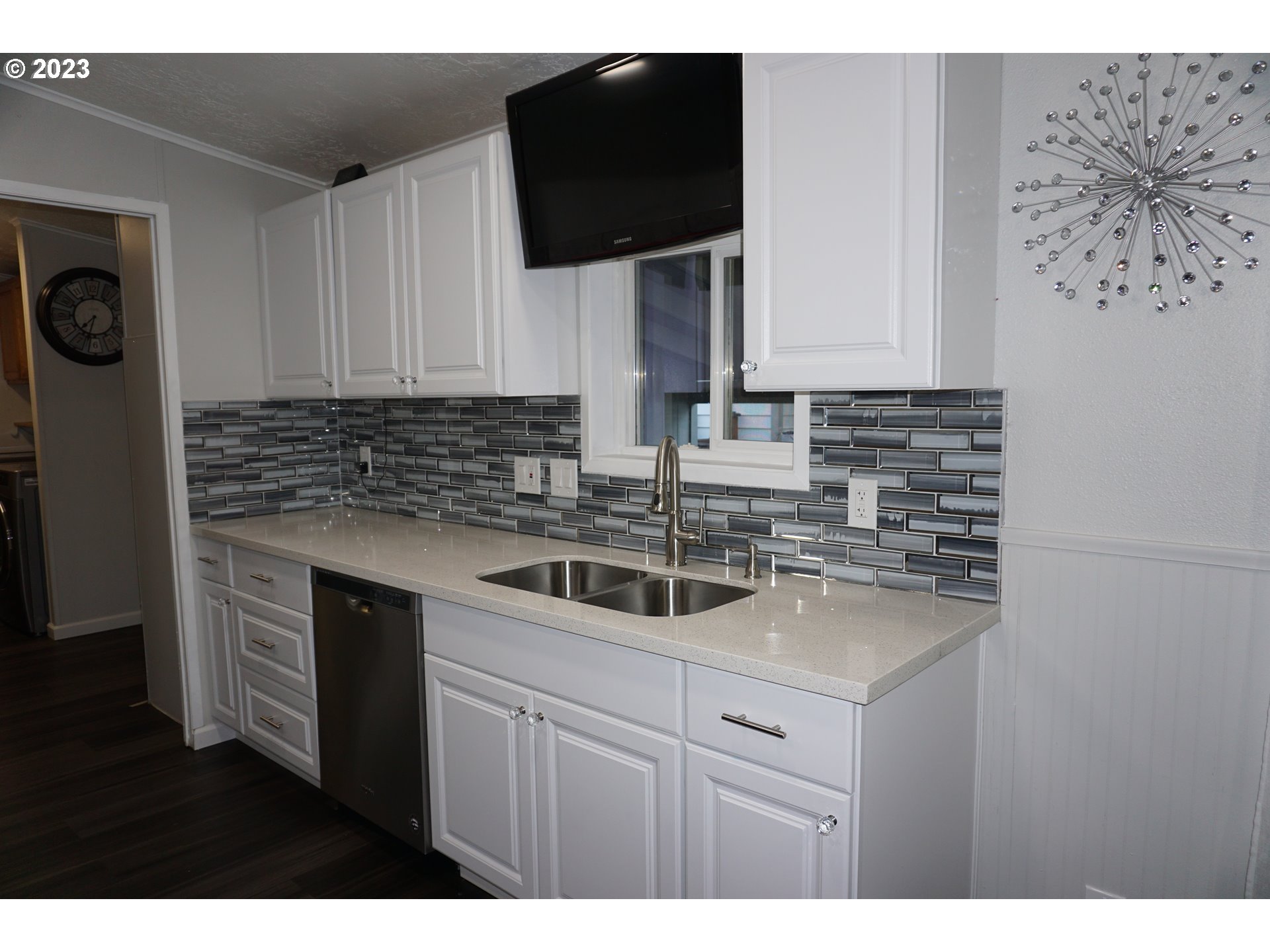 1949 Southeast Palmquist Road Gresham, OR 97080 - Photo 8 of 31 a kitchen with a sink and cabinets