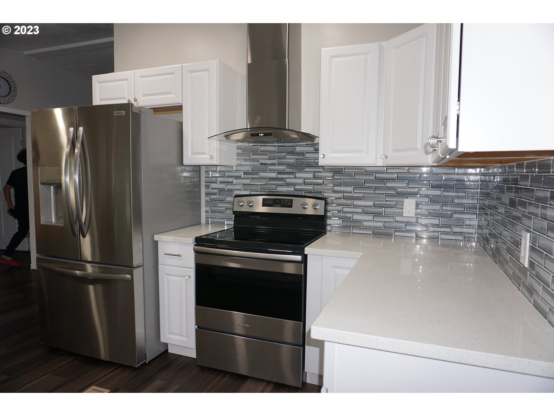 1949 Southeast Palmquist Road Gresham, OR 97080 - Photo 9 of 31 a kitchen with stainless steel appliances and refrigerator