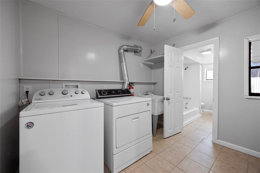137 South 12th Street Pittsburgh, PA 15203 - Photo 12 of 24 a utility room with dryer and washer
