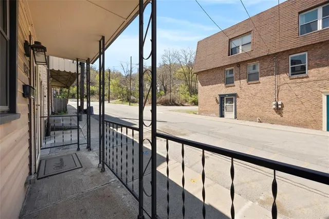 a view of a building from a balcony