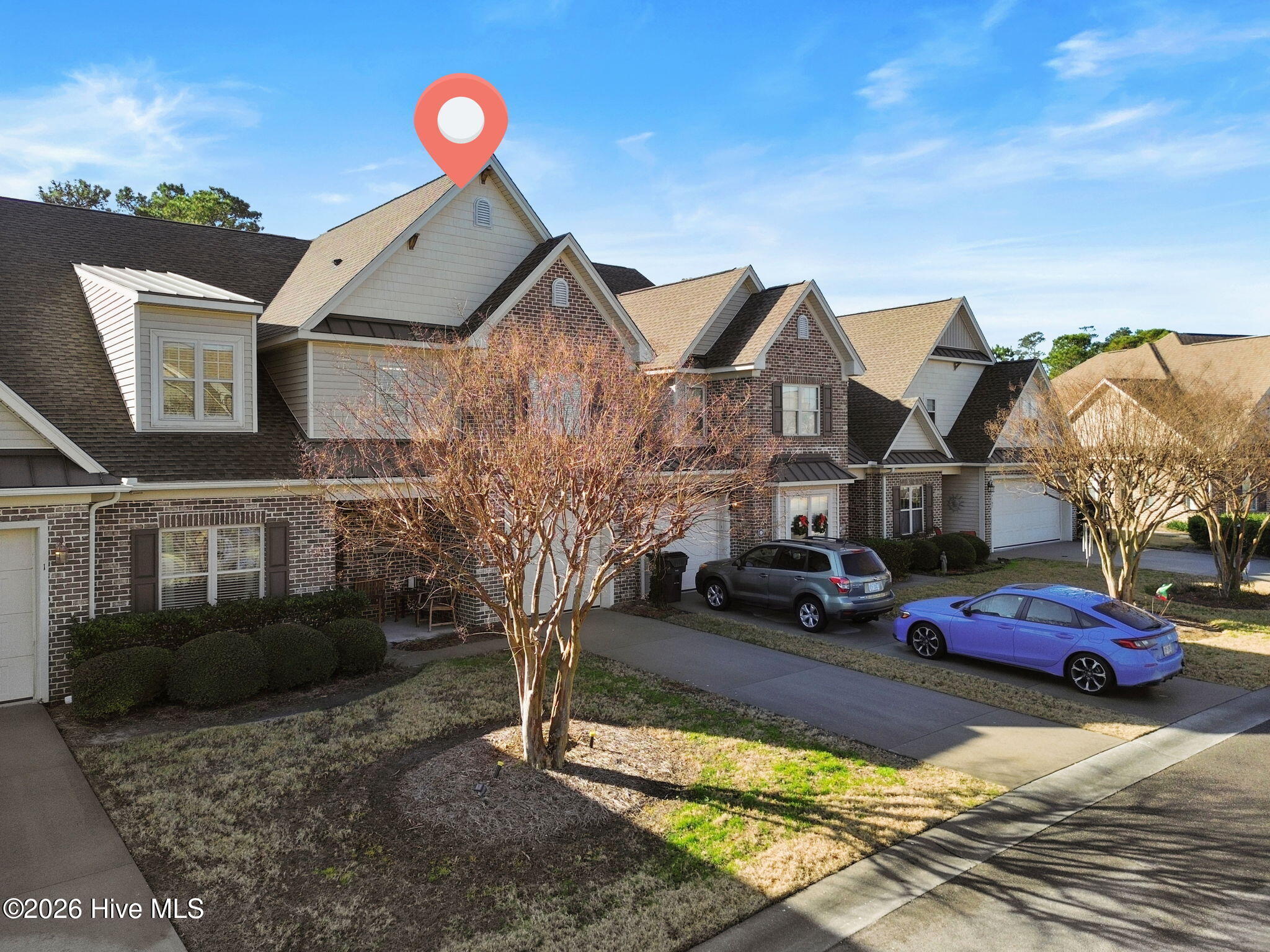 4197 Cambridge Cove Road, Unit 2 Southport, NC 28461 - Photo 2 of 60 7-web-or-mls-DJI_0773 angle pin