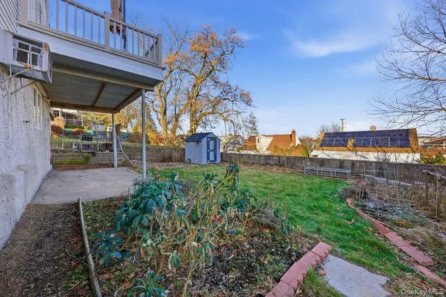a view of a backyard with plants