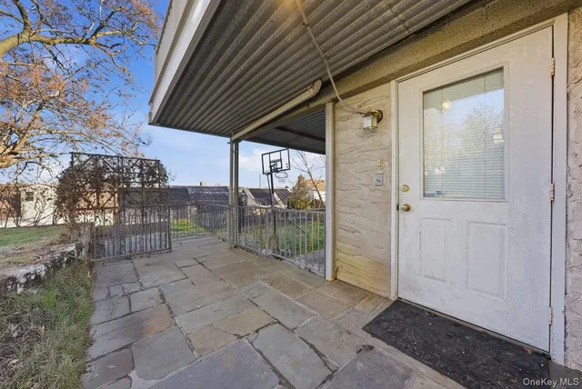 a view of house with a yard