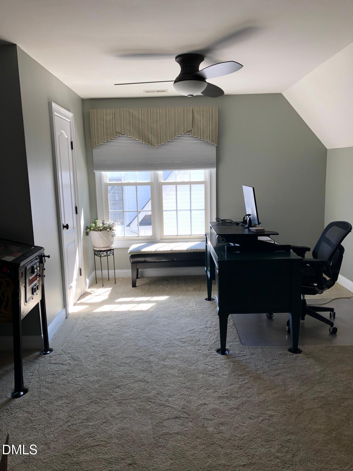 133 Fort Jackson Road Morrisville, NC 27560 - Photo 16 of 25 a workspace with furniture and a window