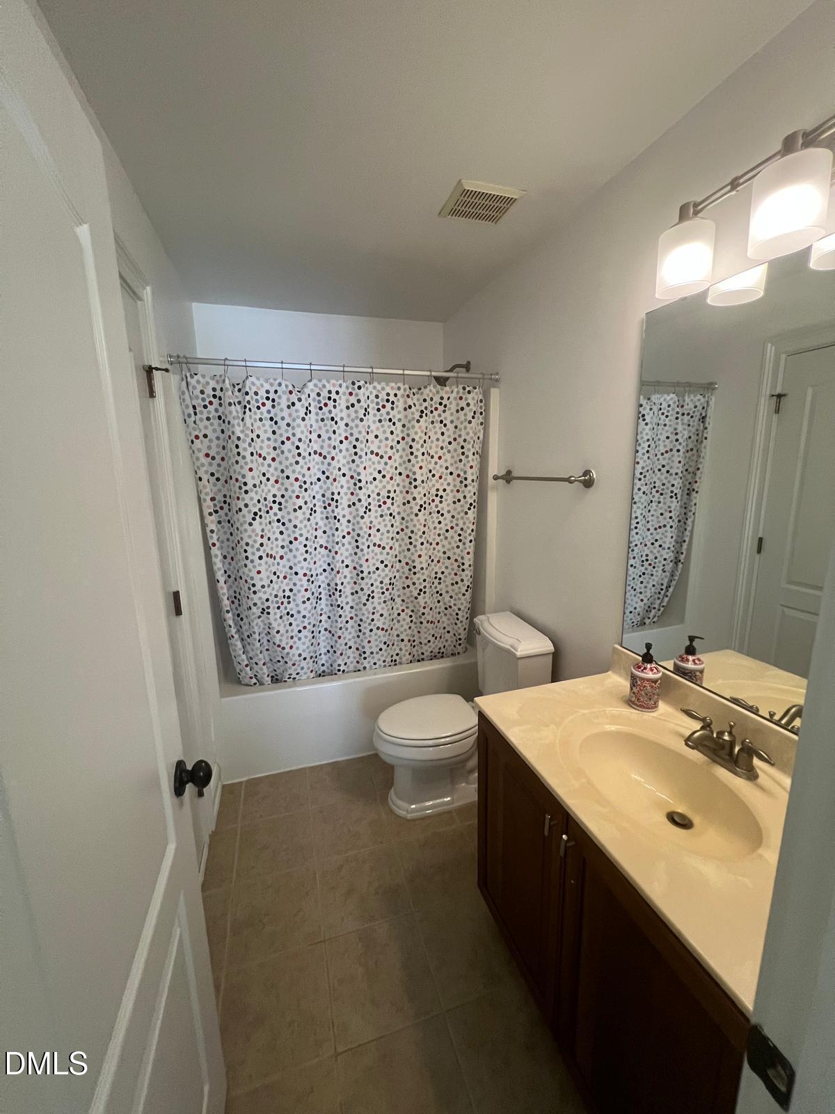133 Fort Jackson Road Morrisville, NC 27560 - Photo 19 of 25 a bathroom with a sink a toilet and shower