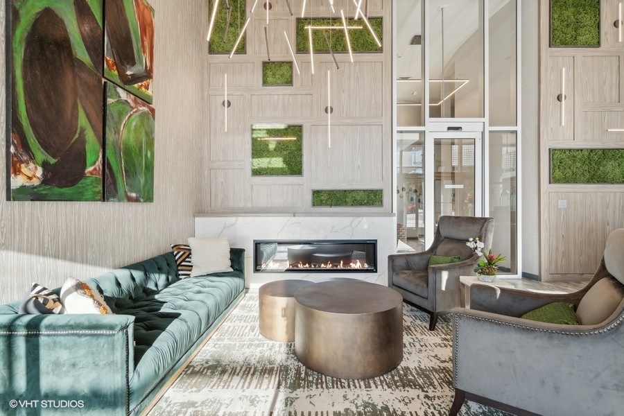 701 South Wells Street, Unit 1904 Chicago, IL 60607 - Photo 16 of 22 a living room with furniture and a fireplace