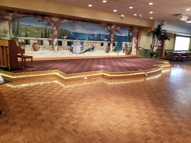 a view of a living room and kitchen