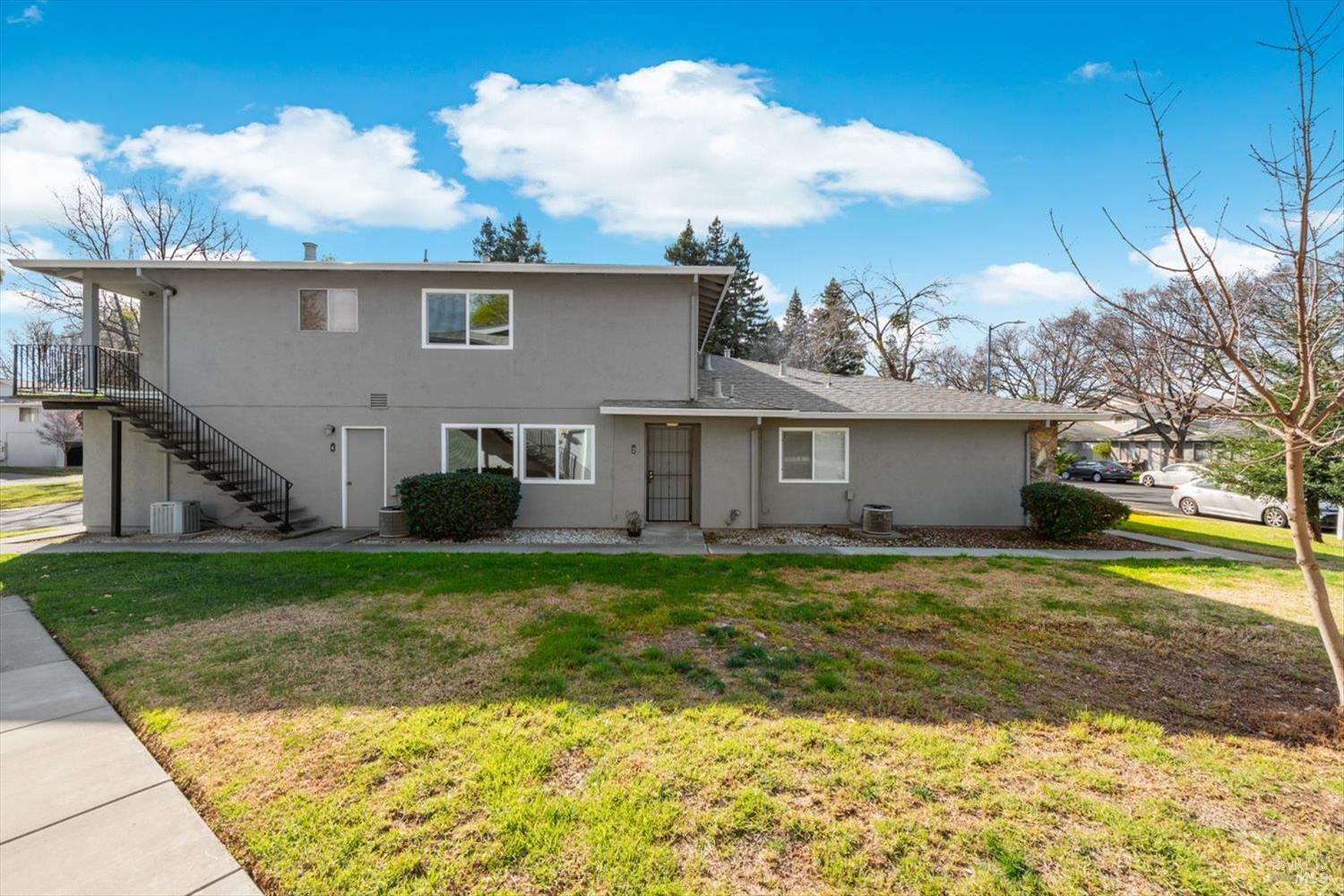 130 Del Rio Circle, Unit 2 Vacaville, CA 95687 - Photo 24 of 33 a view of a house with backyard and a tree