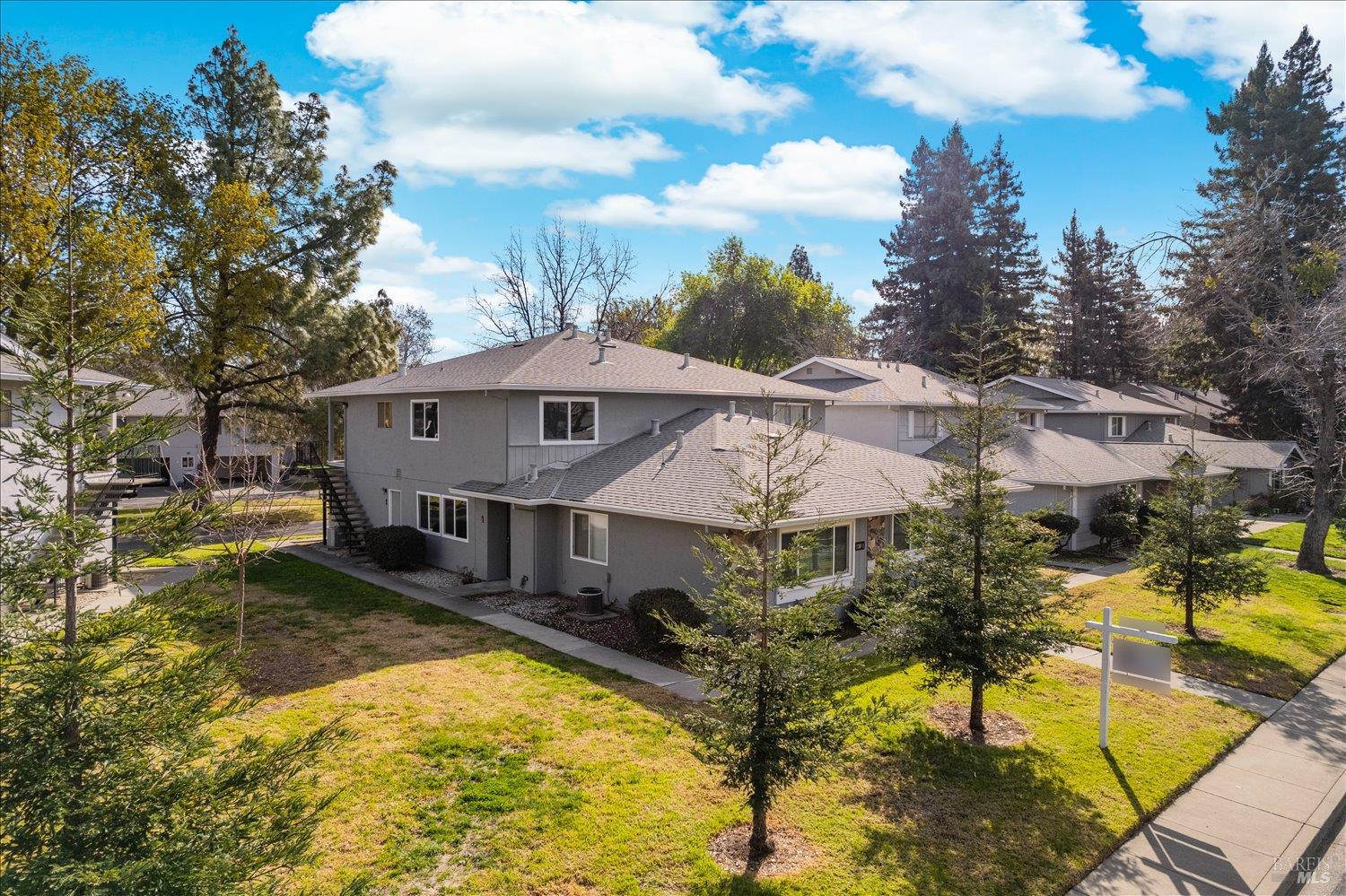 130 Del Rio Circle, Unit 2 Vacaville, CA 95687 - Photo 27 of 33 a view of a house with swimming pool and sitting area
