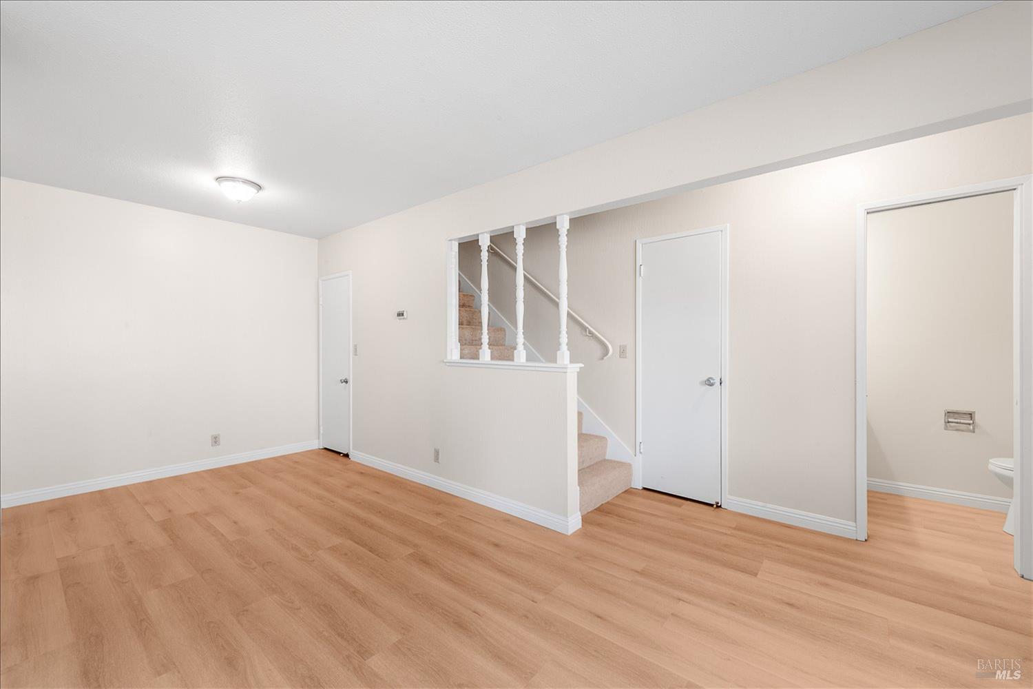 130 Del Rio Circle, Unit 2 Vacaville, CA 95687 - Photo 6 of 33 wooden floor in an empty room