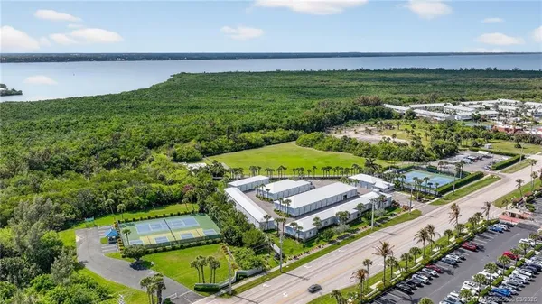 a view of a city with a lake