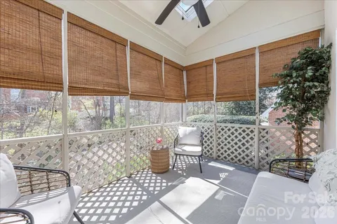 a view of house with backyard