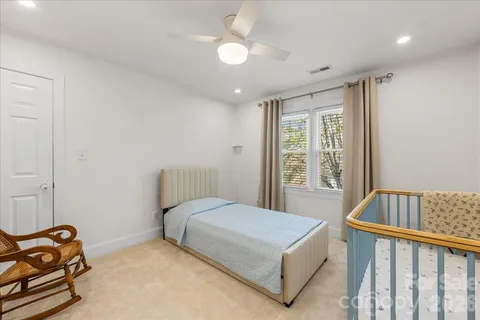 a room with furniture and a flat screen tv