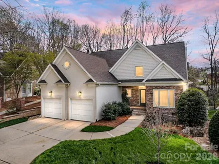 a view of a pathway with a backyard