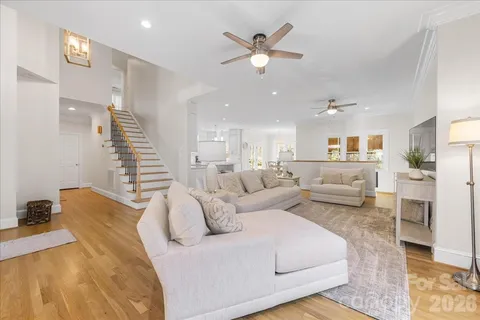 a bathroom with a sink mirror and toilet