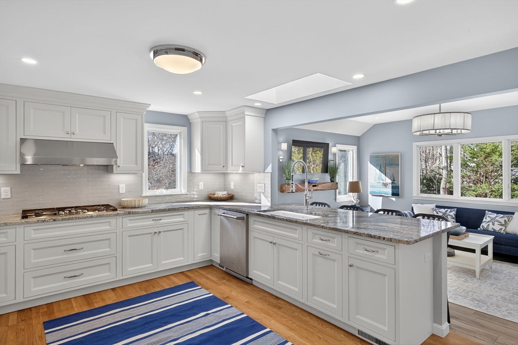 31 High Head Road Dennis, MA 02660 - Photo 11 of 32 a kitchen with sink stove and cabinets