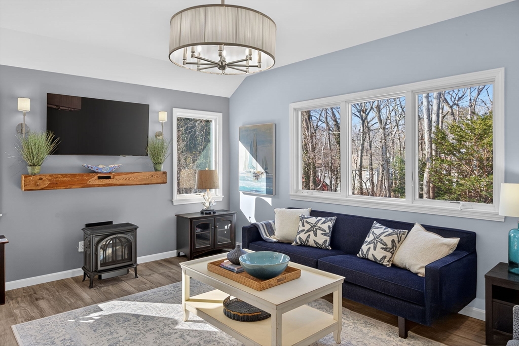 31 High Head Road Dennis, MA 02660 - Photo 14 of 32 a living room with furniture and a flat screen tv