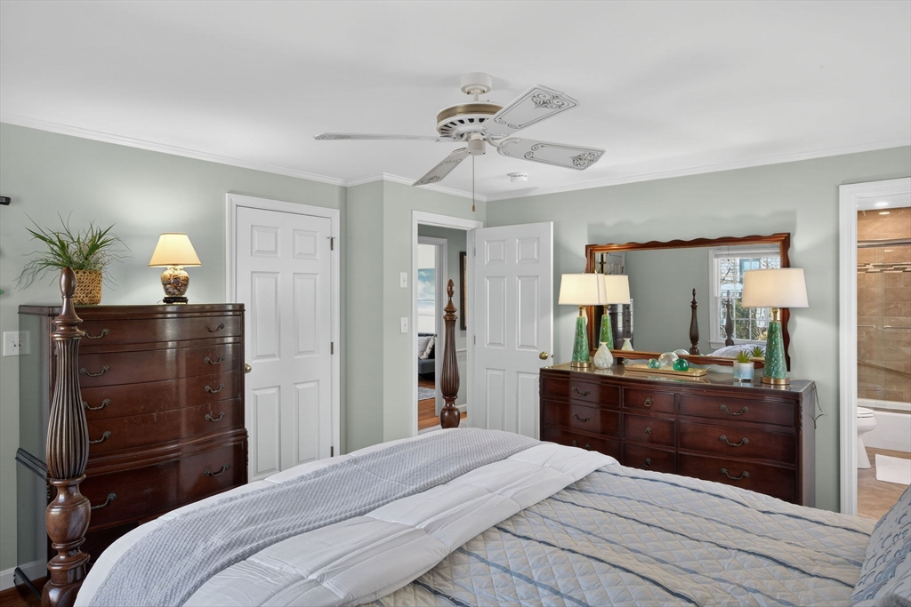 31 High Head Road Dennis, MA 02660 - Photo 21 of 32 a bedroom with a bed and wooden floor
