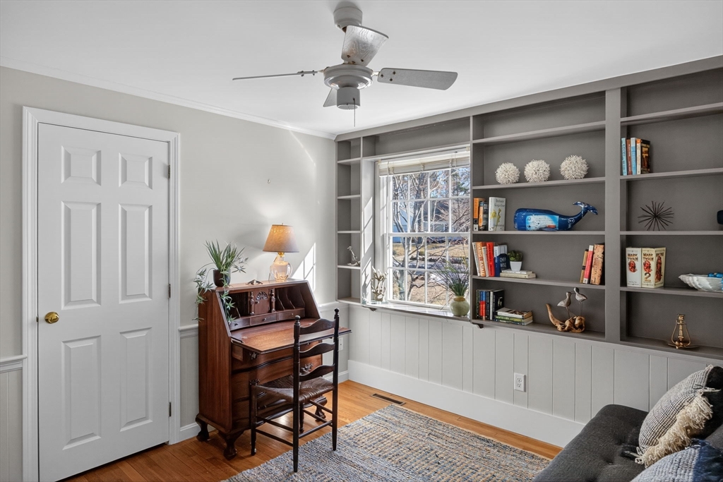 31 High Head Road Dennis, MA 02660 - Photo 27 of 32 a room with furniture and a bookshelf
