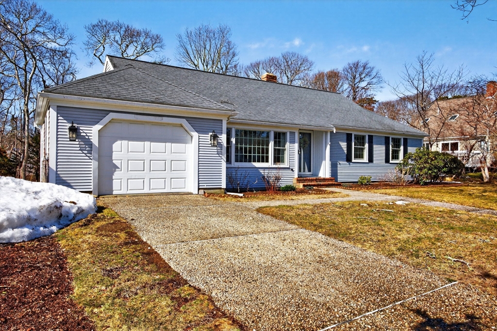 31 High Head Road Dennis, MA 02660 - Photo 3 of 32 a front view of a house with a yard