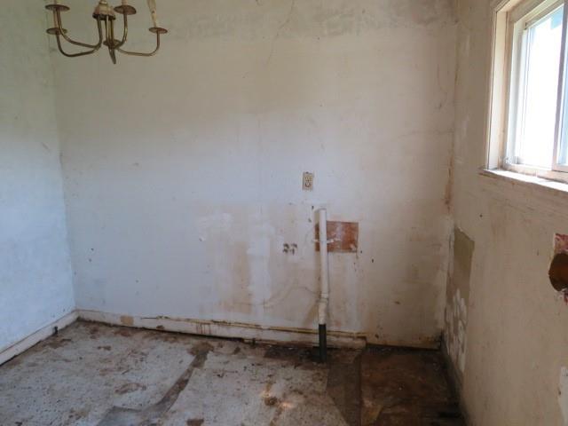 115 Chess Street Monongahela, PA 15063 - Photo 9 of 23 a view of a room with rack on the wall and a window