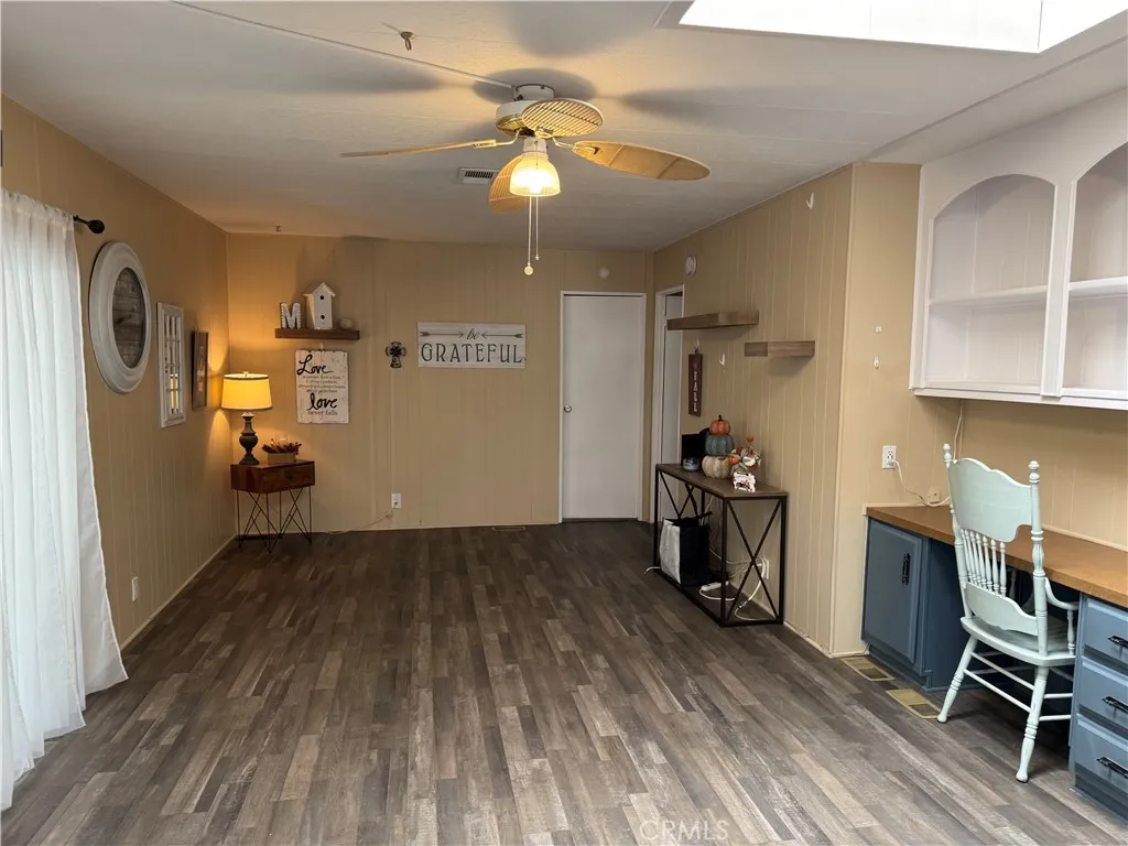 35218 Fir, Unit 183 Yucaipa, CA 92399 - Photo 17 of 35 a view of a workspace with furniture and wooden floor