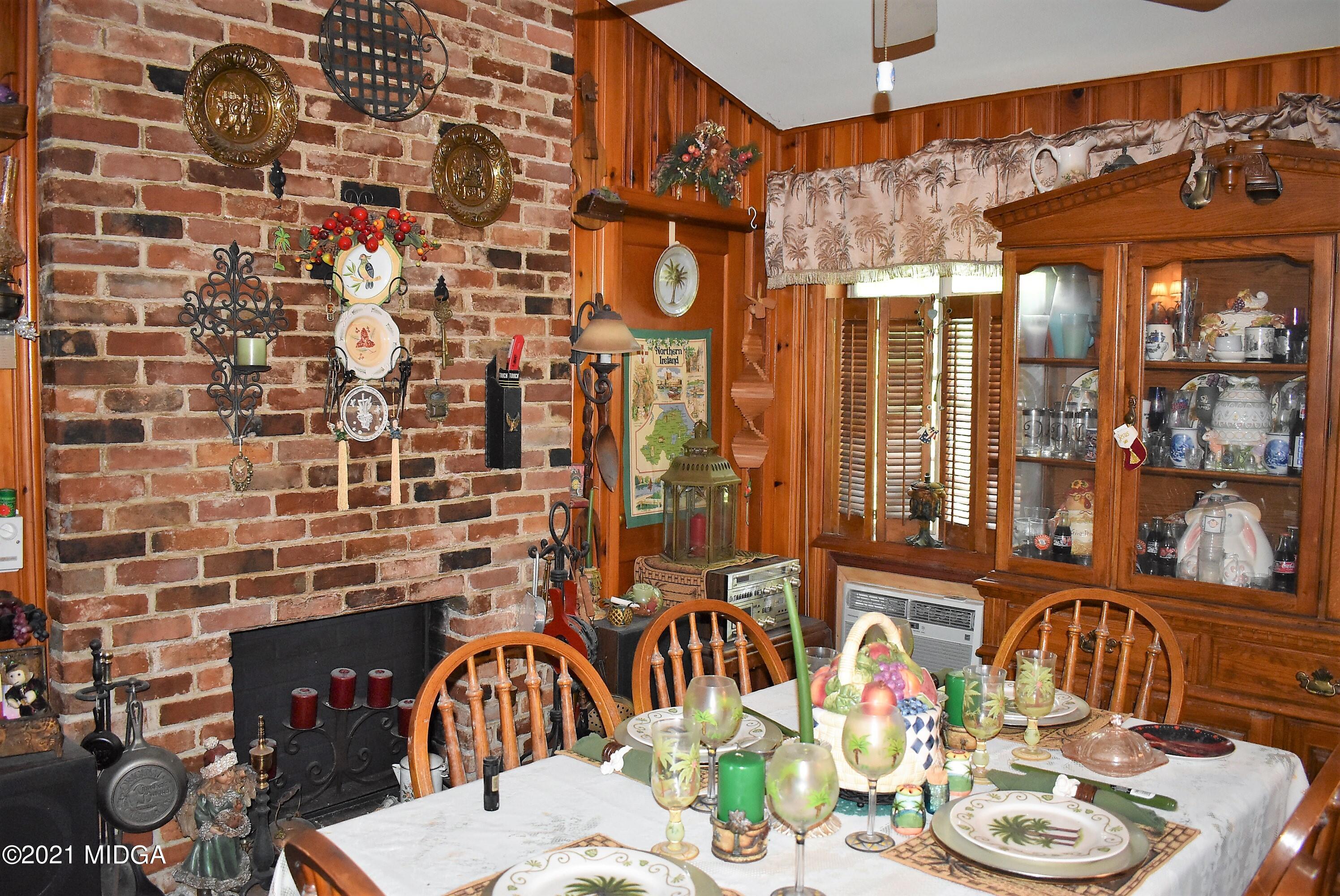 4238 Jones Road Macon, GA 31216 - Photo 11 of 31 a dining room with furniture and window
