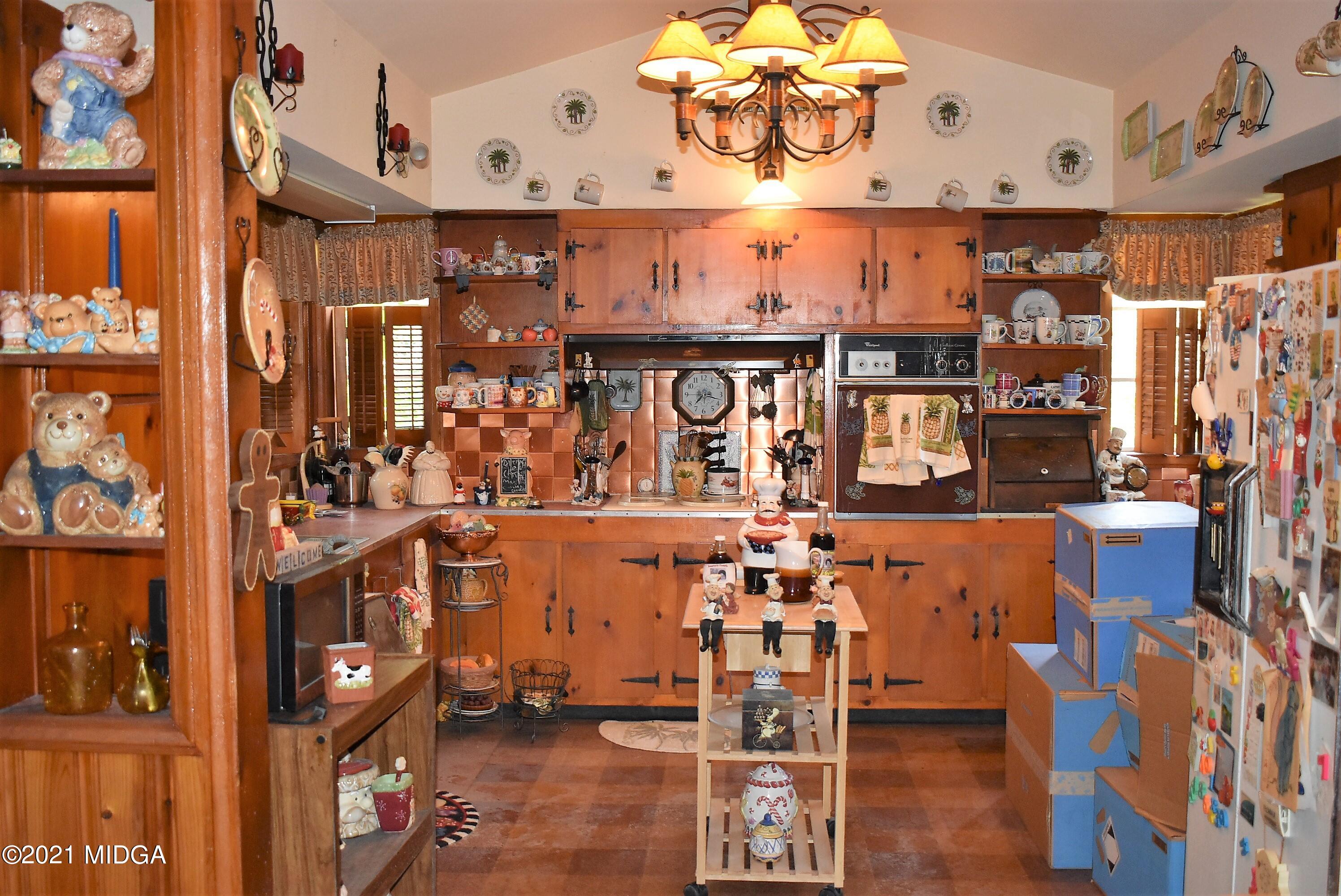 4238 Jones Road Macon, GA 31216 - Photo 12 of 31 a view of dinning table and chairs in a room