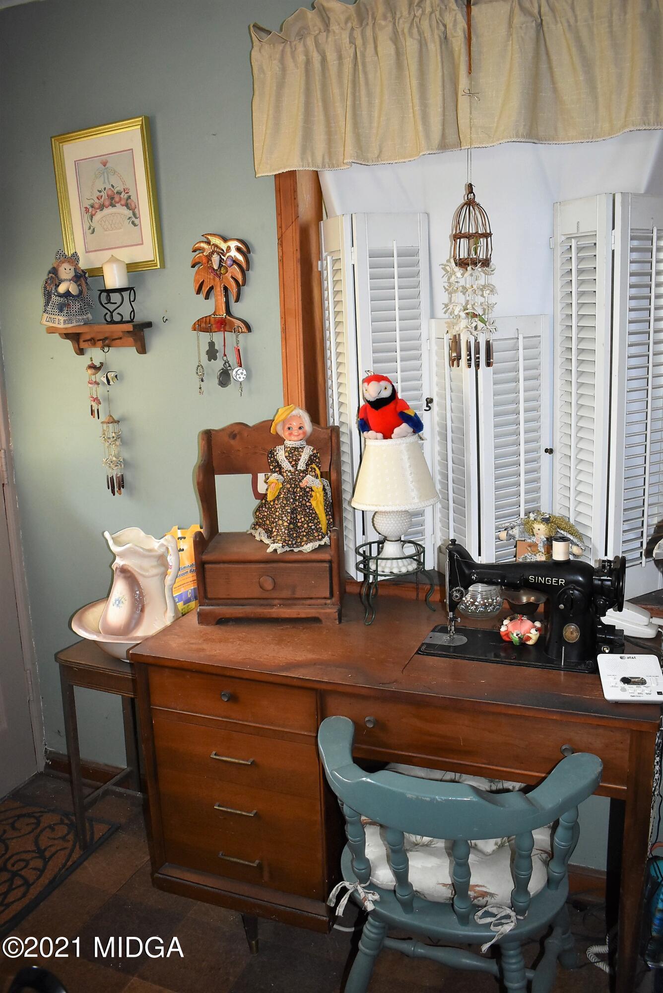 4238 Jones Road Macon, GA 31216 - Photo 24 of 31 a room with furniture and window