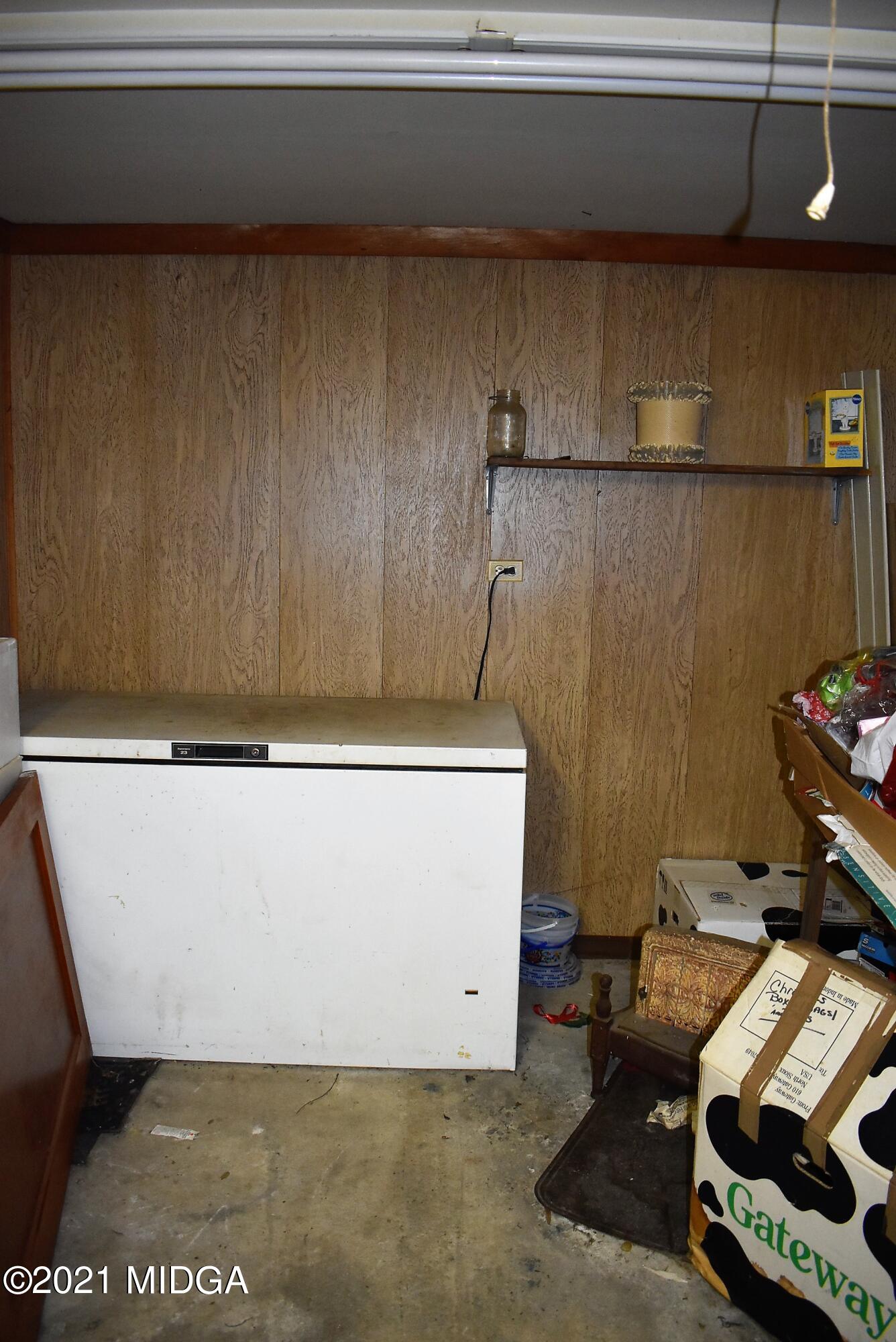4238 Jones Road Macon, GA 31216 - Photo 28 of 31 a view of storage and utility room with two washing machine