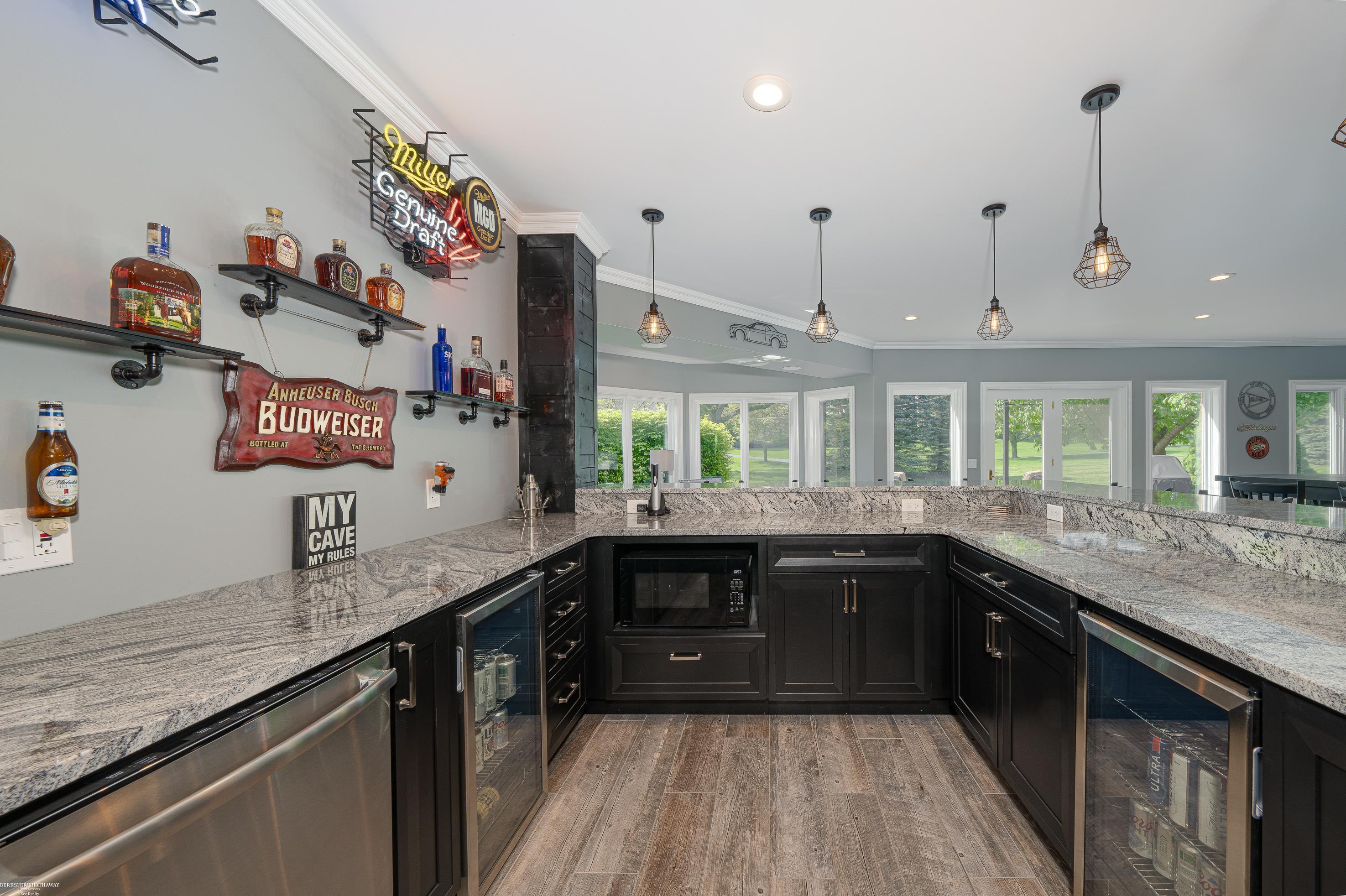 4372 Timber Ridge Drive Romeo, MI 48065 - Photo 54 of 84 Wood Cabinets, Granite Counters, Stone Base & Backsplash, S/S sink, Dishwasher 2 Bar Refrigerators