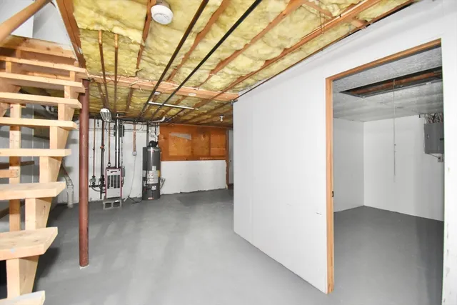 a view of empty room with stairs